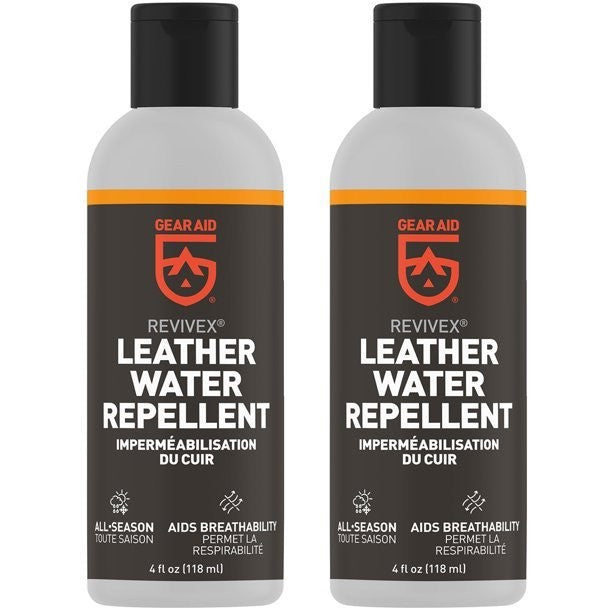 Two bottles of Gear Aid Revivex leather footwear water repellent, 4 oz. each, upright.