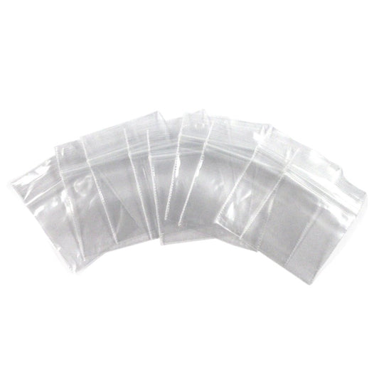 Clear 100-piece self-locking plastic bags, 2mm thick, stacked for storage needs