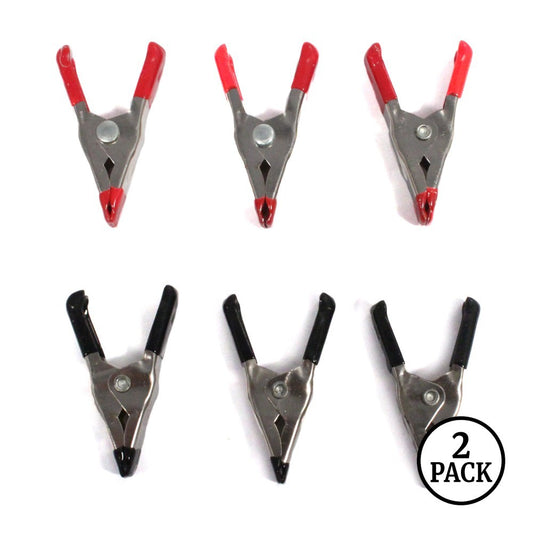 Twelve metal spring clamps with rubber grip handles grouped together.