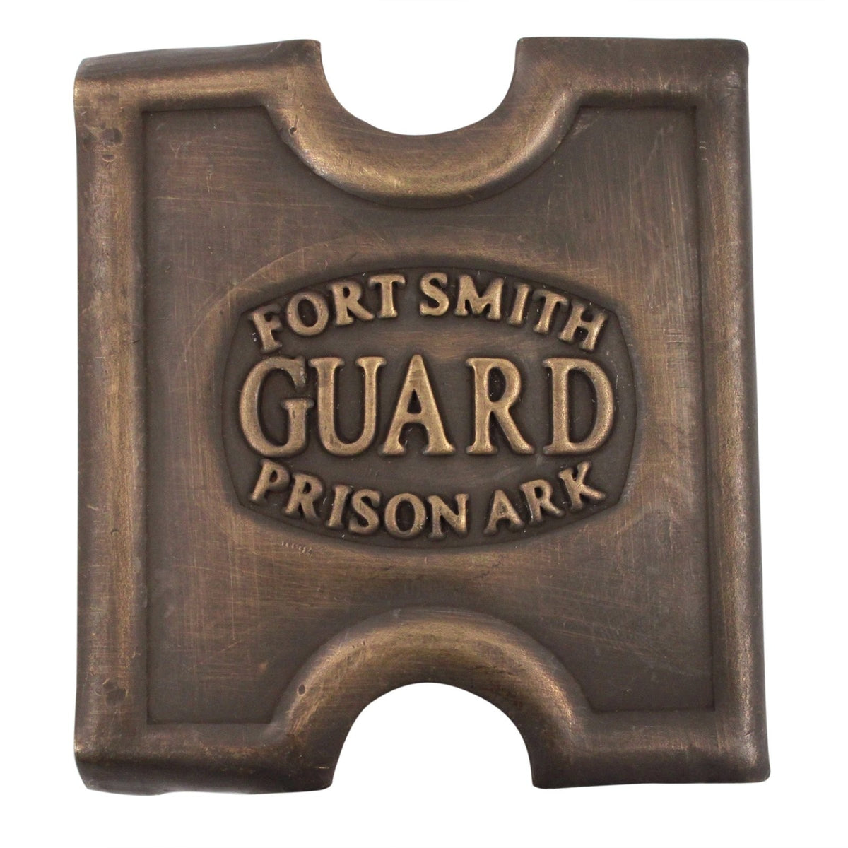 Brass belt buckle labeled Fort Smith Prison Guard, metallic finish, rectangular shape.