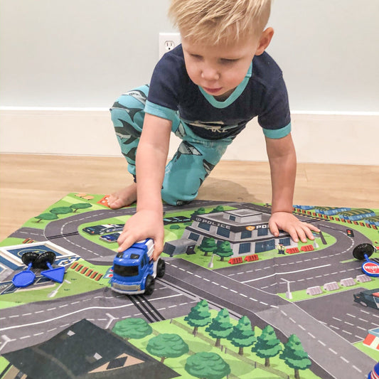 Eight friction powered urban city fire truck toy cars with included play mat from Kidplokio