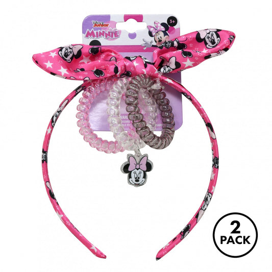 Two red Minnie Mouse headbands and three colorful coil bracelets arranged for girls' fashion play.