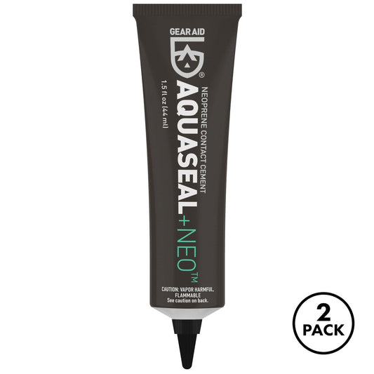 Two black 1.5 oz Seal Cement neoprene repair kits with precision applicators placed side by side.