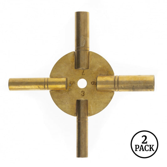 Two brass grandfather clock keys with four prongs each, placed together.