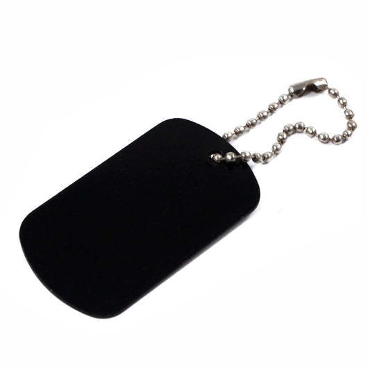 Single blank aluminum dog tag key chain against a plain background.
