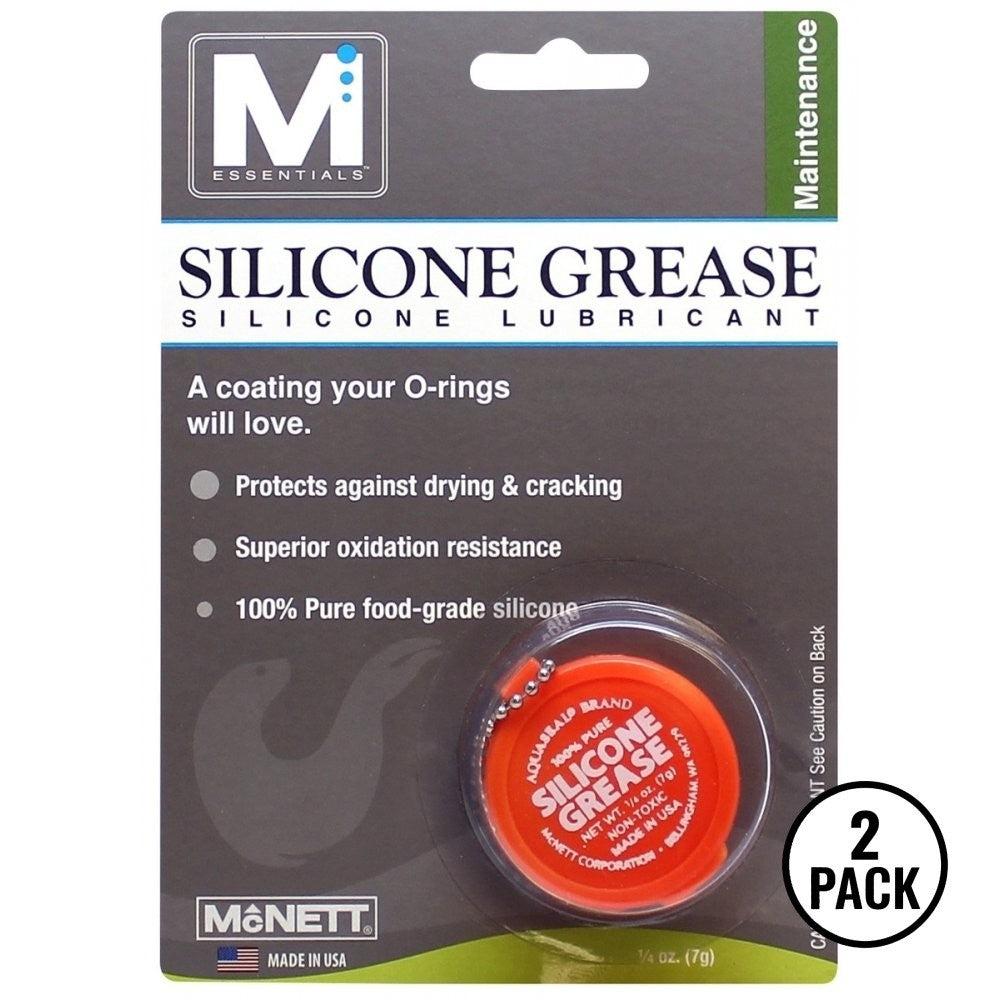 Two small containers labeled silicone O ring valve protection grease, each 1/4 oz.