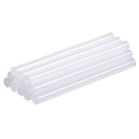 Twelve clear 4-inch mini glue sticks grouped together on a white background