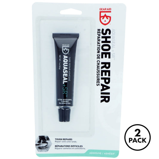Two tubes of Freesole shoe and boot repair adhesive in retail packaging