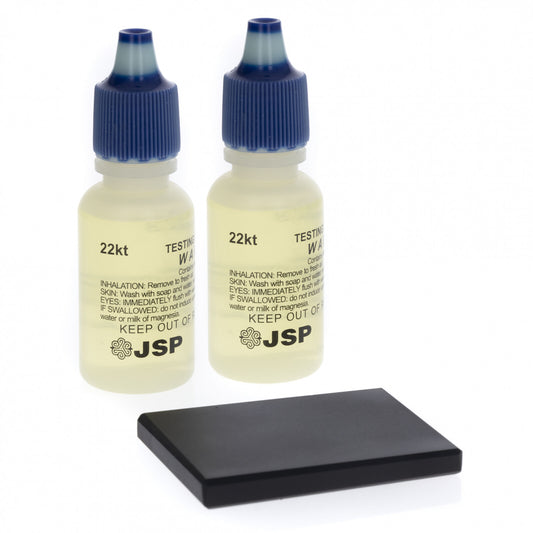ToolTreaux 3-piece fine jewelry gold testing kit with gold testing stone shown together on a plain surface.